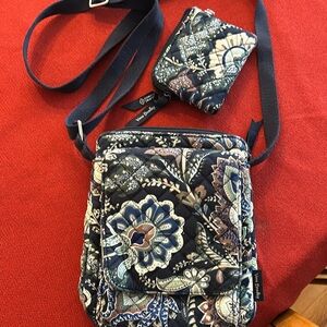 Vera Bradley floral crossbody with matching wallet. Great for travel.